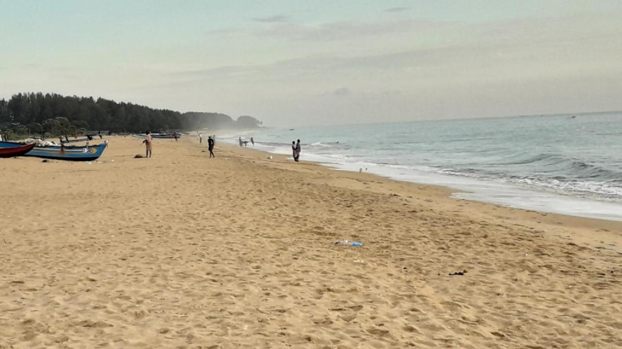 בטיקלואה Kunam Beach Rest Inn מראה חיצוני תמונה