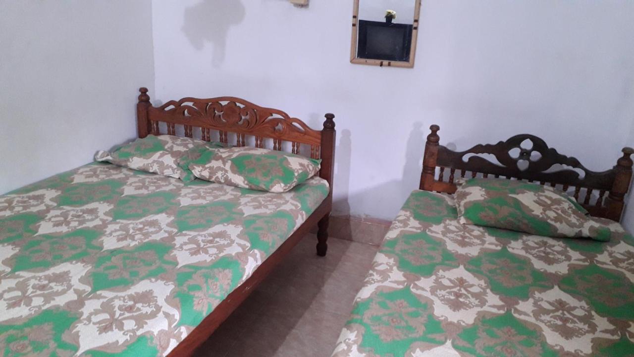 בטיקלואה Kunam Beach Rest Inn מראה חיצוני תמונה