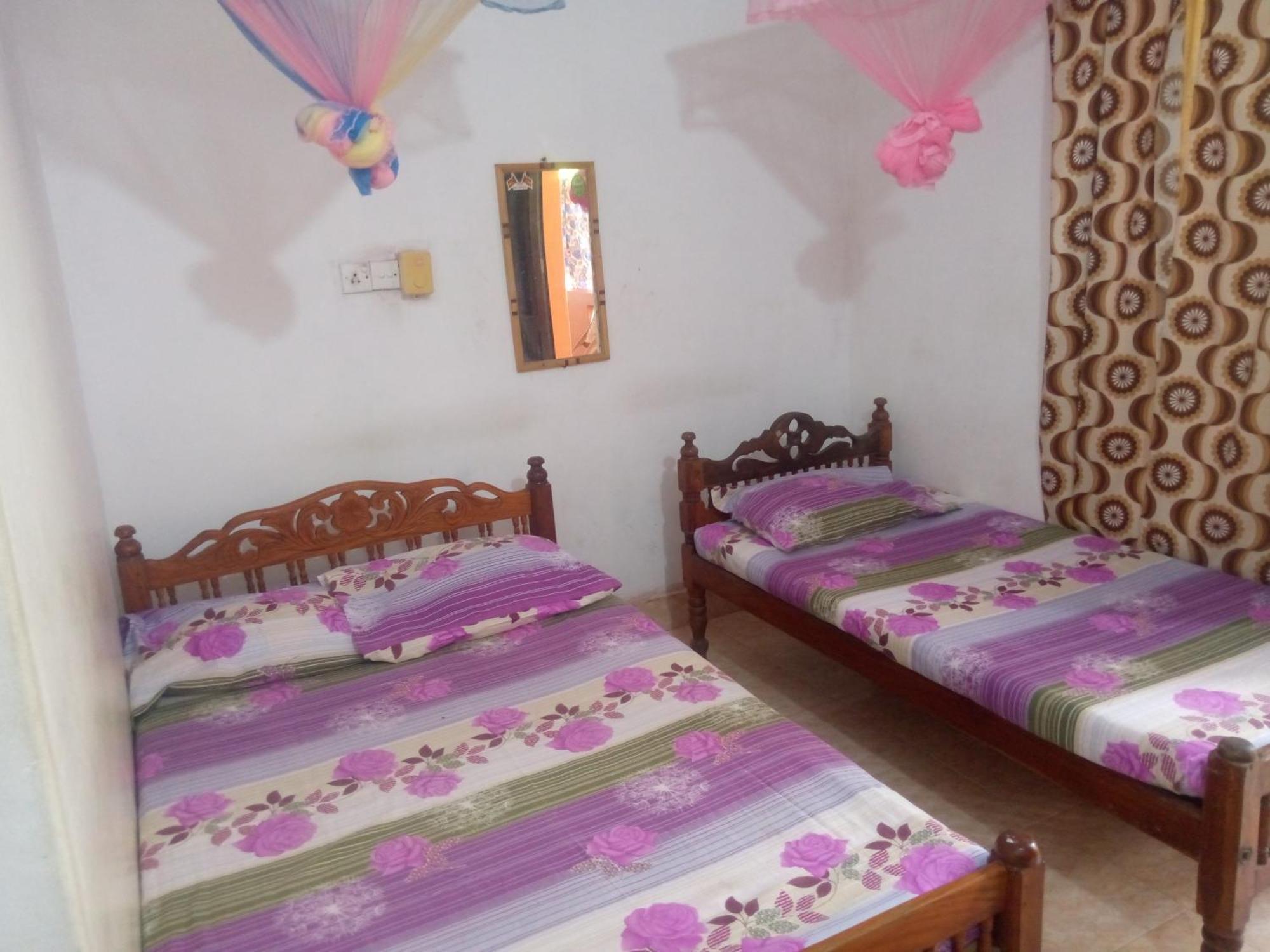 בטיקלואה Kunam Beach Rest Inn מראה חיצוני תמונה