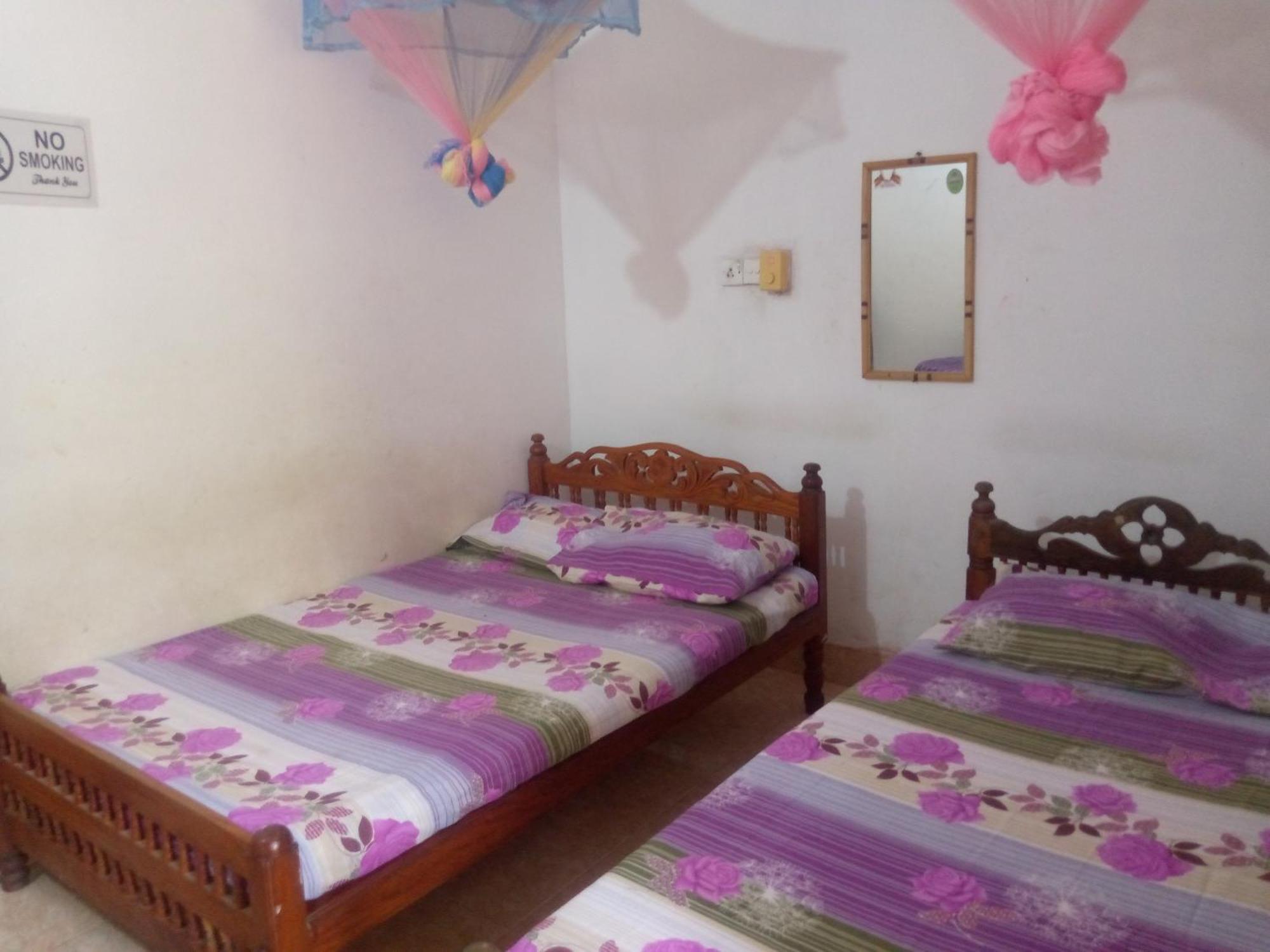 בטיקלואה Kunam Beach Rest Inn מראה חיצוני תמונה