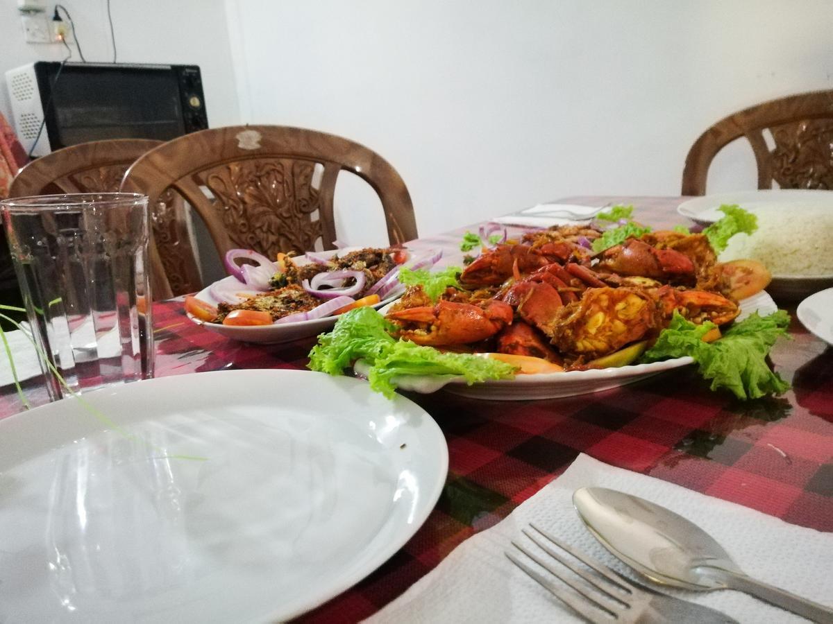 בטיקלואה Kunam Beach Rest Inn מראה חיצוני תמונה