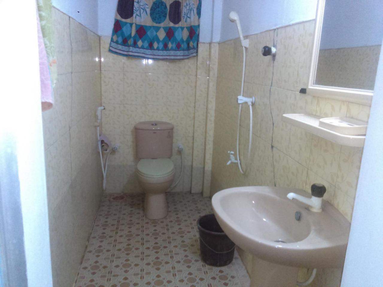 בטיקלואה Kunam Beach Rest Inn חדר תמונה