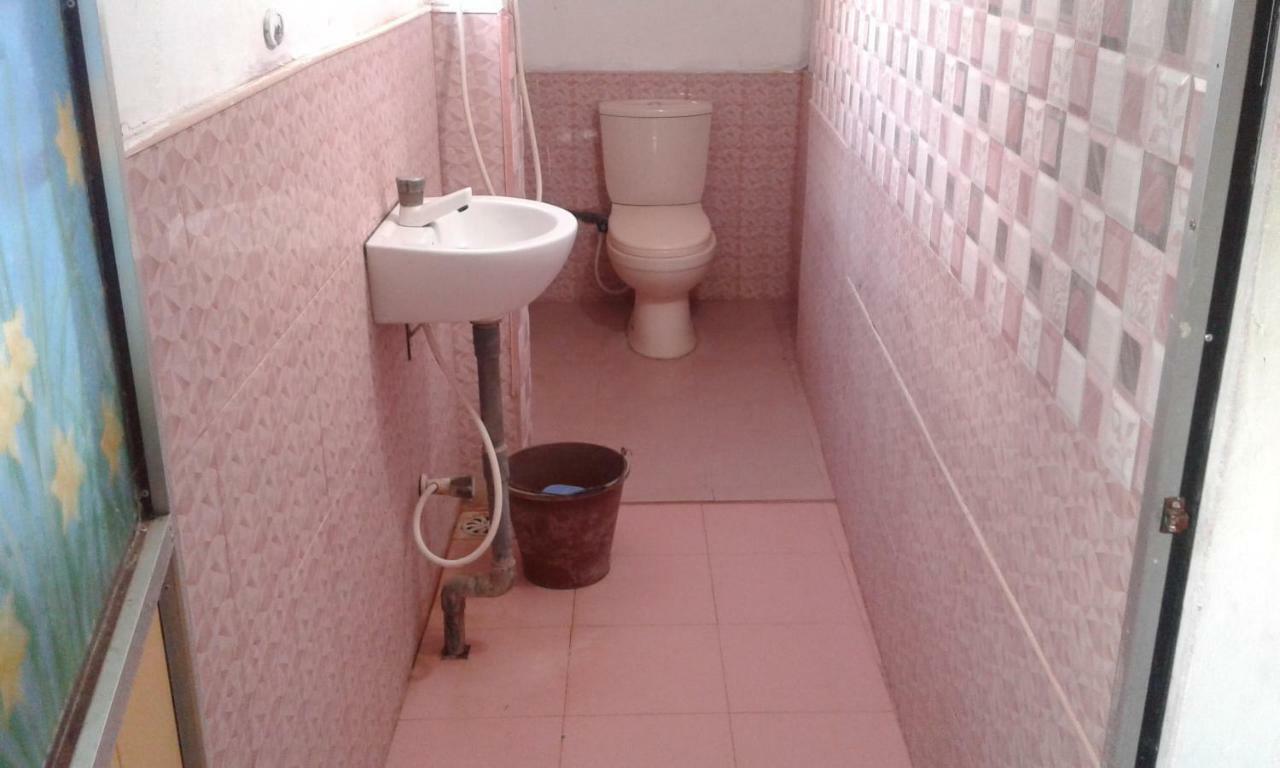 בטיקלואה Kunam Beach Rest Inn חדר תמונה