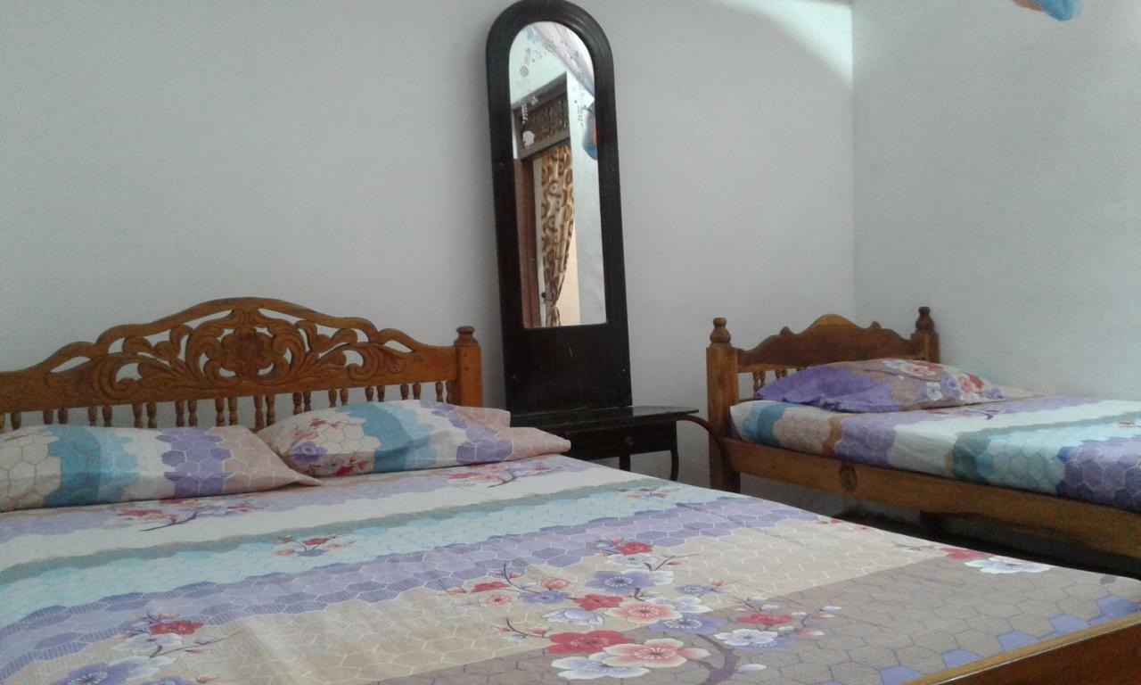 בטיקלואה Kunam Beach Rest Inn מראה חיצוני תמונה