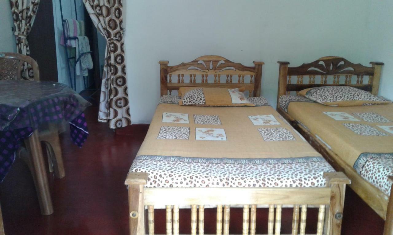 בטיקלואה Kunam Beach Rest Inn מראה חיצוני תמונה
